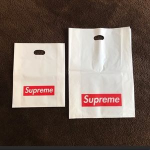 1 small and 1 large Supreme shopping bag